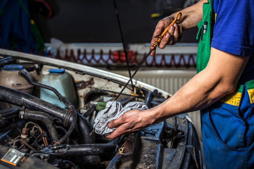 Checking the Dipstick is Part of Oil Change Service